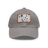 Monochrome baseball cap with repeating pattern design, white/light brown patch.