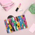 Modern abstract clutch bag with bold colors, perfect statement piece.