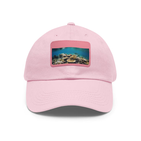 Stylish white baseball cap with colorful coral reef design.