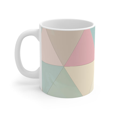 Chic pastel geometric coffee mug with modern seamless pattern.