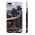 Rustic cabin nestled in serene mountain landscape phone case.