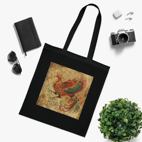 Black cotton tote bag with majestic phoenix design, perfect for all seasons.