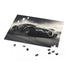Bugatti Speed Puzzle with high-speed racing sports car on scenic background.