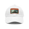 Stylish white baseball cap with intricate Atlantis-inspired patch.