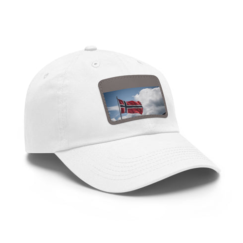 White cotton baseball cap with red, white and blue Norwegian flag patch.
