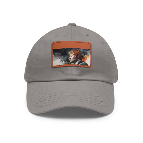 Ed Sheeran watercolor splatter baseball cap with light brown patch.