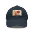 Blooming Blossoms baseball cap in white with light brown rectangle patch.
