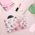 Pink and white cherry blossom vegan clutch bag made in the USA