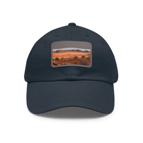 Desert landscape baseball cap in white with light brown patch.