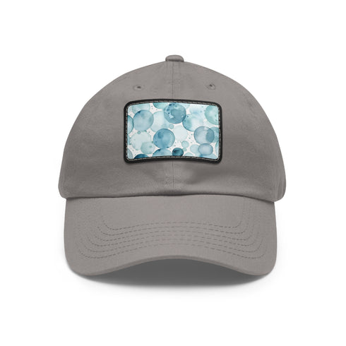 White baseball cap with mesmerizing ice blue water color pattern.