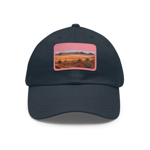 Desert landscape rock formation baseball cap in white with light brown patch.