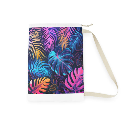 Neon tropical leaves laundry bag with vibrant print palm trees.