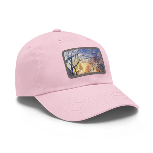 Vibrant Eiffel Tower watercolor baseball cap, white with light brown patch.