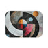 Modern abstract geometric bath mat in vibrant colors for stylish bathrooms.