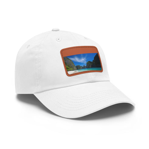 White cotton baseball cap with light brown patch inspired by Island Paradise.