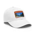 White cotton baseball cap with light brown patch inspired by Island Paradise.