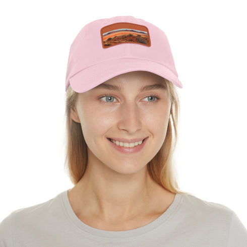 Desert landscape-inspired white cotton hat with light brown patch.
