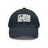 Monochrome baseball cap with repeating pattern, white/light brown rectangle patch.