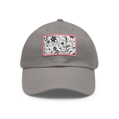 Monochrome baseball cap with repeating black and white pattern.