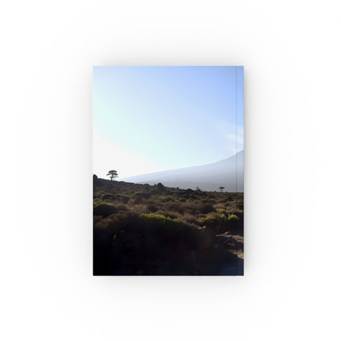 Kilimanjaro's Peak Adventure Journal - Capture the awe-inspiring Tanzanian sun on Africa's highest peak! Ideal for documenting climbs and seeking inspiration.