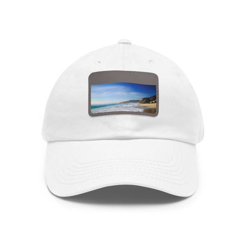 Malibu Dreamin baseball cap with light brown patch and beach image.