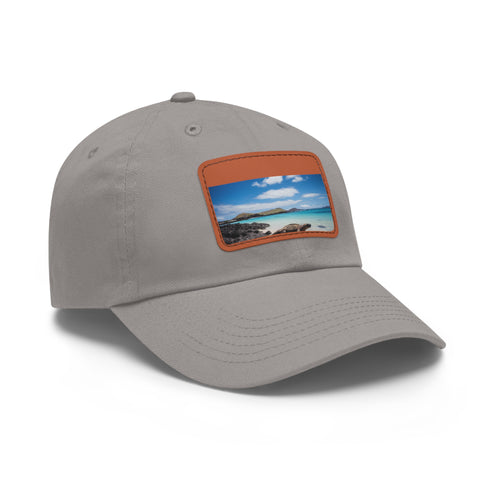 Galapagos Explorer baseball cap in white with light brown patch.