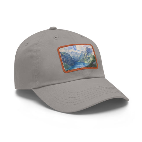 Vibrant Swiss Alps watercolor baseball cap with white/light brown patch.