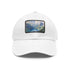 Swiss Alps watercolor baseball cap in white with light brown patch.