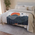 perfect for a minimalist mountain escape. Find your serenity with this cozy blanket today.