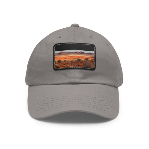 Desert landscape white hat with light brown patch and unique rock design.