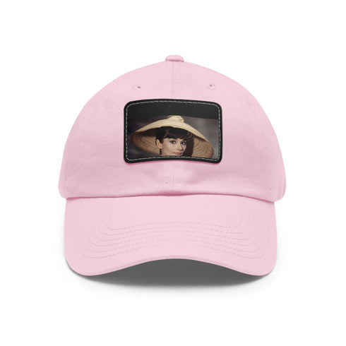 Audrey Hepburn monochrome baseball cap with light brown rectangle patch.