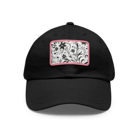 Monochrome baseball cap with black and white repeating pattern design.