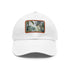 White cotton baseball cap with light brown patch, inspired by Congo rainforest.