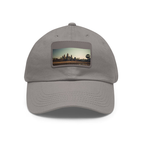 Stylish white cotton cap with Angkor Wat-inspired patch.