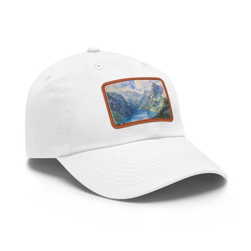 Swiss Alps watercolor baseball cap with light brown patch.