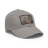 Steampunk baseball cap with gear design on white light brown patch.
