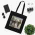 Surreal black cotton tote with floating island landscape design.