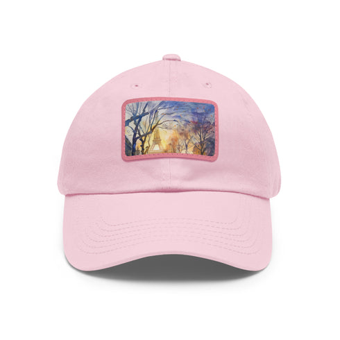 Eiffel Tower watercolor baseball cap with light brown patch design.
