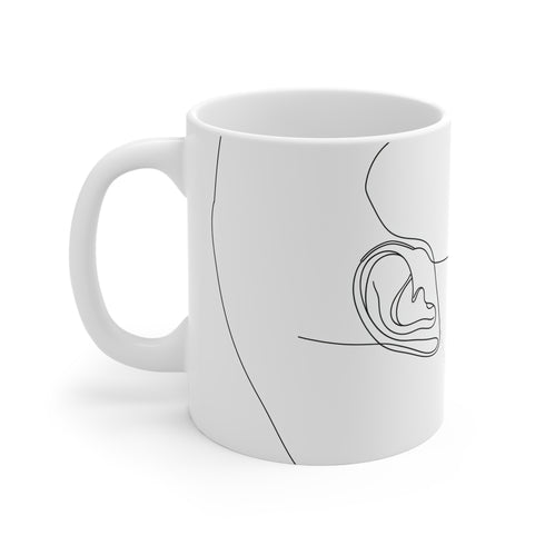 Sophisticated minimalist line art face ceramic coffee mug for a stylish morning.