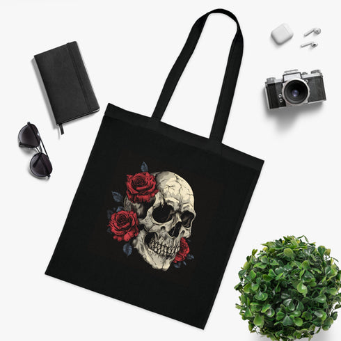 Dark floral skull design on black cotton tote bag.