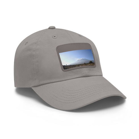 White cotton hat with light brown patch, perfect for Kilimanjaro adventure.
