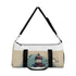 Coastal lighthouse dream duffel bag with hand-drawn waves print.