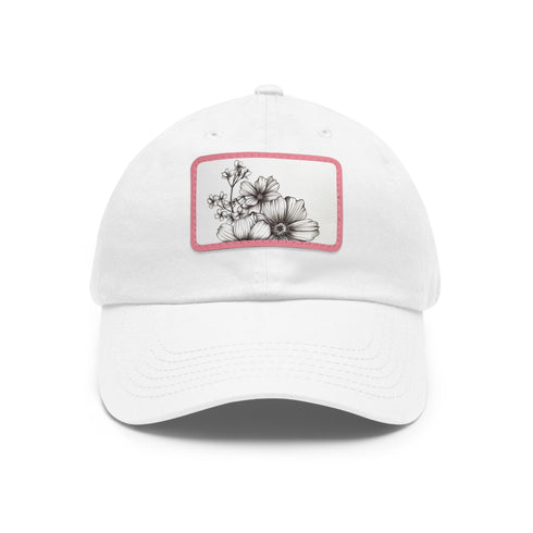 Hand-drawn floral white baseball cap with light brown patch.