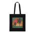 Stylish black cotton tote bag with golden hour palms design.