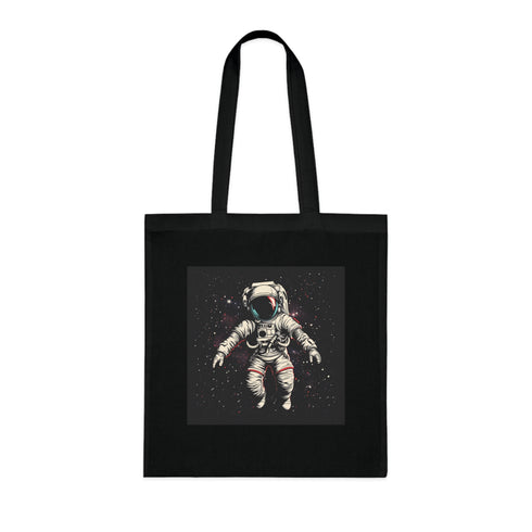 Black cotton tote bag with bold astronaut design for space adventures.