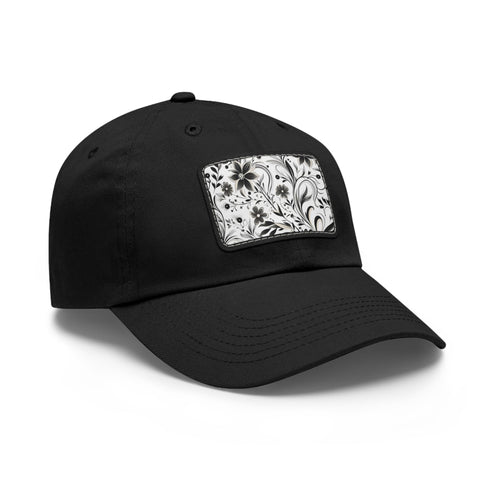 Monochrome black and white baseball cap with repeating pattern design.