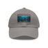 White baseball cap with light brown rectangle patch and Lost City theme.