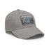 White cotton baseball cap with Chrysler Building watercolor design.