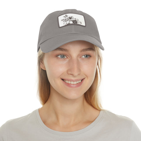 White cotton baseball cap with hand-drawn floral design.