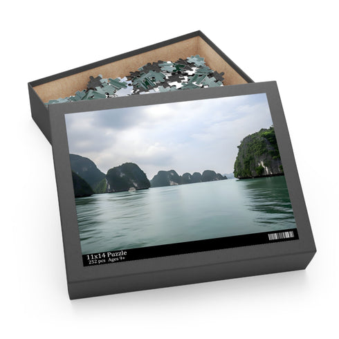 Jigsaw puzzle depicting Halong Bay's emerald waters and limestone cliffs.